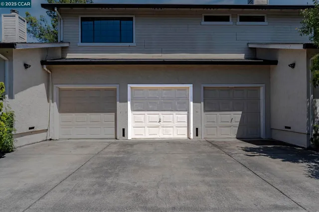 a view of a back yard from a garage