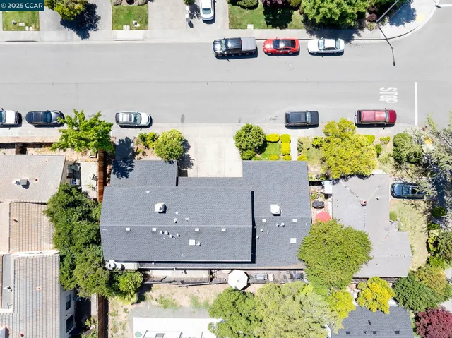 an aerial view of a city with lots of residential buildings