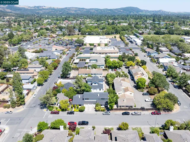 an aerial view of a city with lots of residential buildings