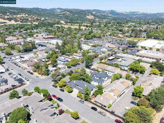 an aerial view of a city with lots of residential buildings
