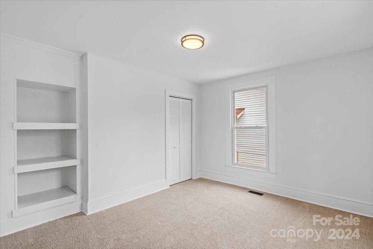 411 West Frederick Street Gaffney, SC 29341 - Photo 11 of 17 a view of an empty room with a window