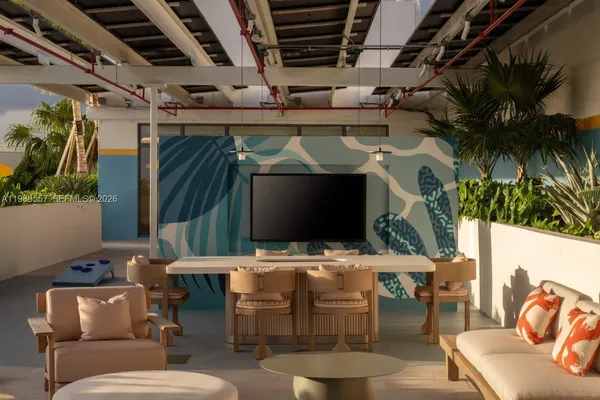 a outdoor living space with furniture and a fireplace