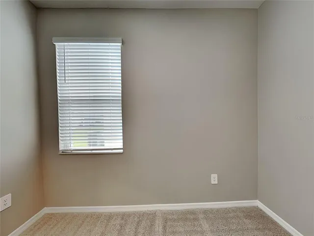 a view of a small space with a window