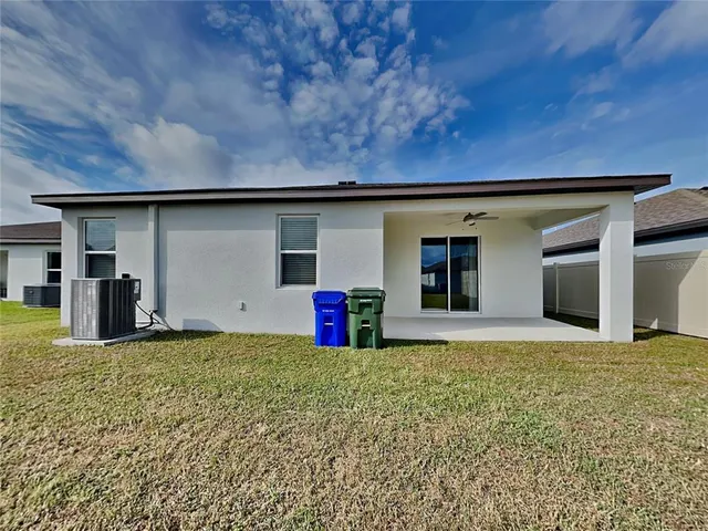 a view of a house with a garage