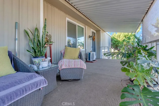 a outdoor living space with furniture and garden view