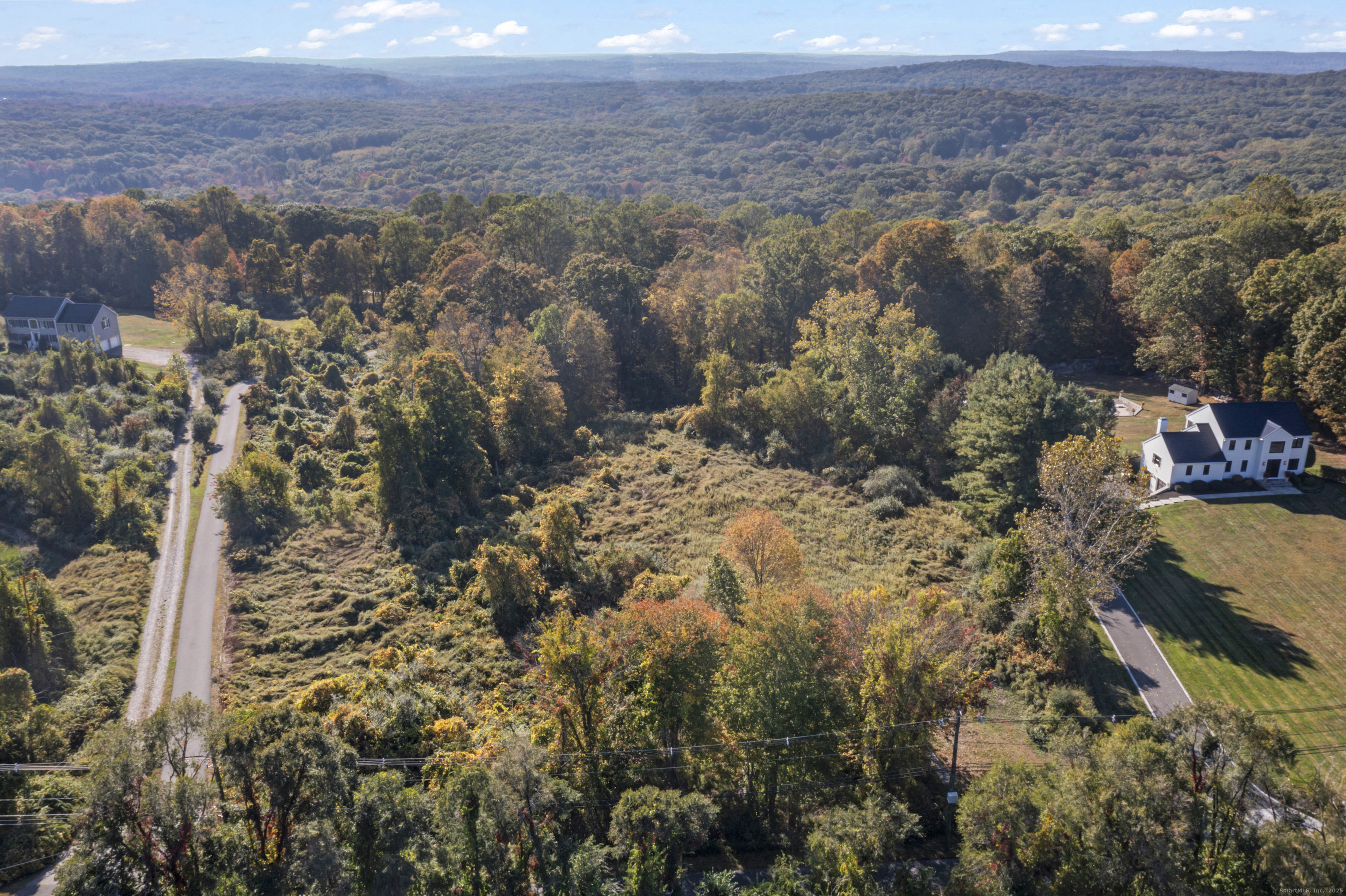 42 Great Ring Road Newtown, CT 06482 - Photo 2 of 5 a view of city and mountain