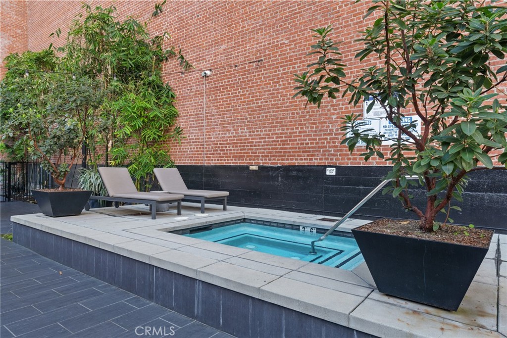 460 South Spring Street, Unit 302 Los Angeles, CA 90013 - Photo 5 of 24 a view of a terrace with chairs