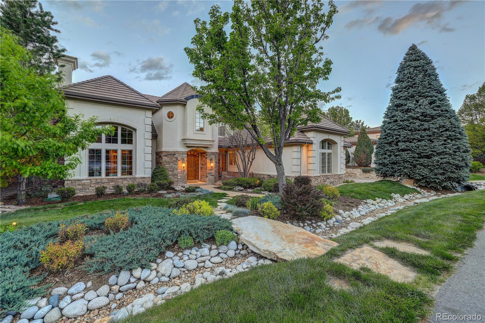 23 Foxtail Circle Cherry Hills Village, CO 80113 - Photo 1 of 40 a front view of a house with a yard
