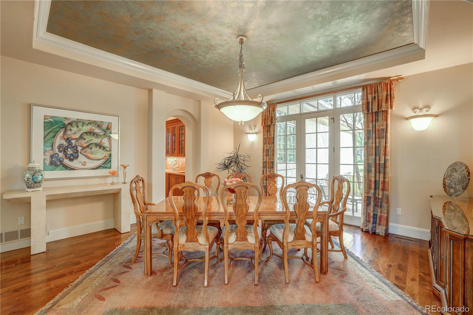 23 Foxtail Circle Cherry Hills Village, CO 80113 - Photo 13 of 40 a view of a dining room with furniture window and wooden floor