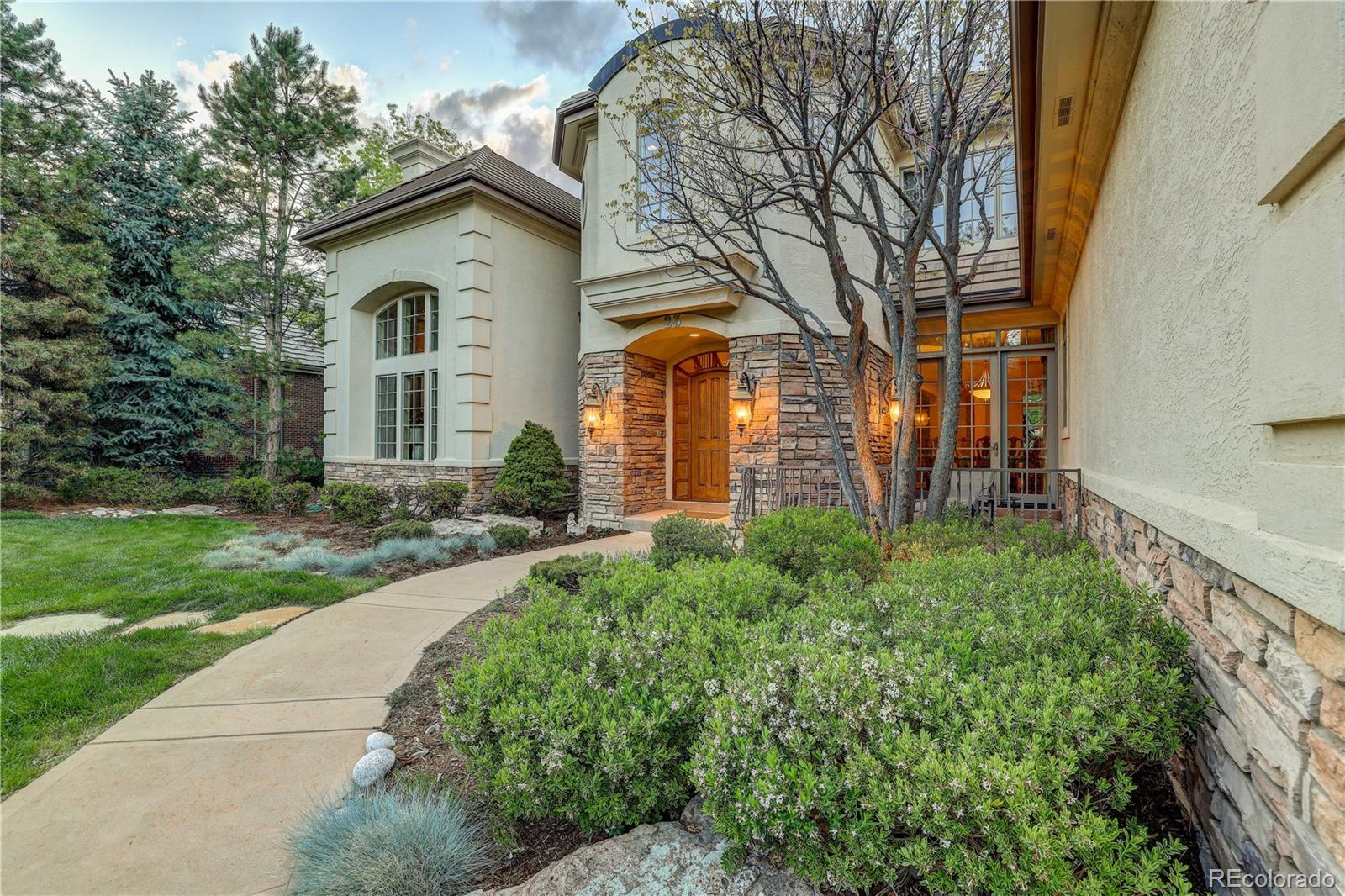 23 Foxtail Circle Cherry Hills Village, CO 80113 - Photo 2 of 40 a view of a front of house with a yard