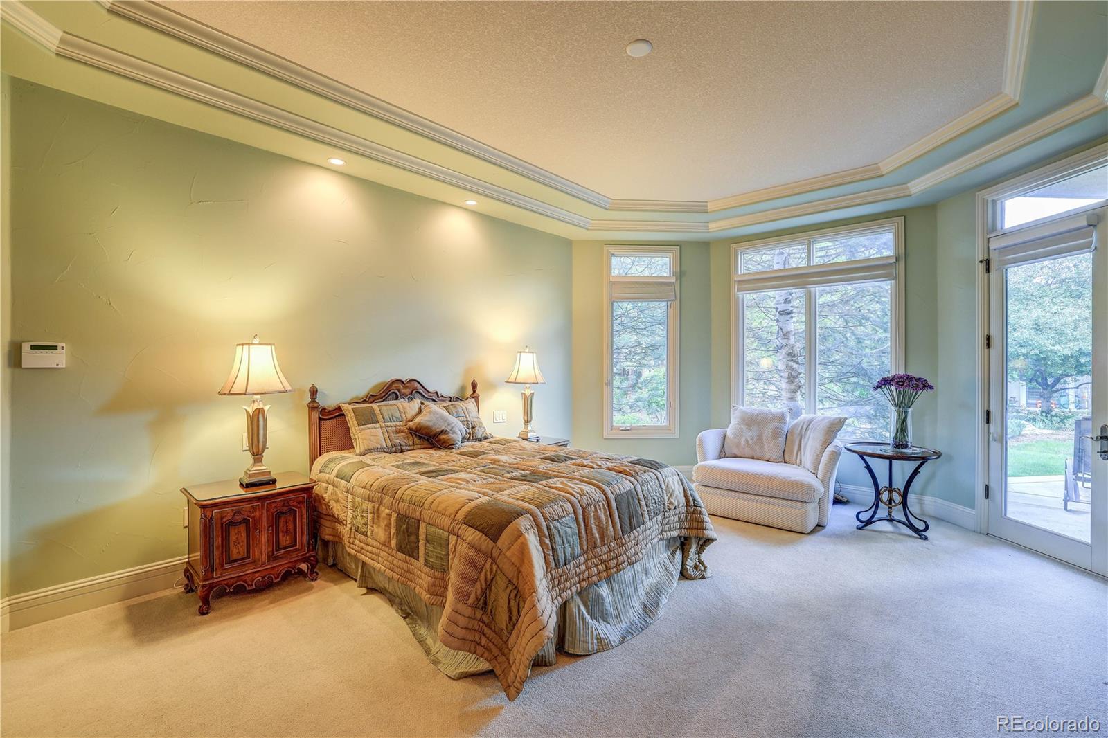 23 Foxtail Circle Cherry Hills Village, CO 80113 - Photo 24 of 40 a bedroom with a bed and a couch