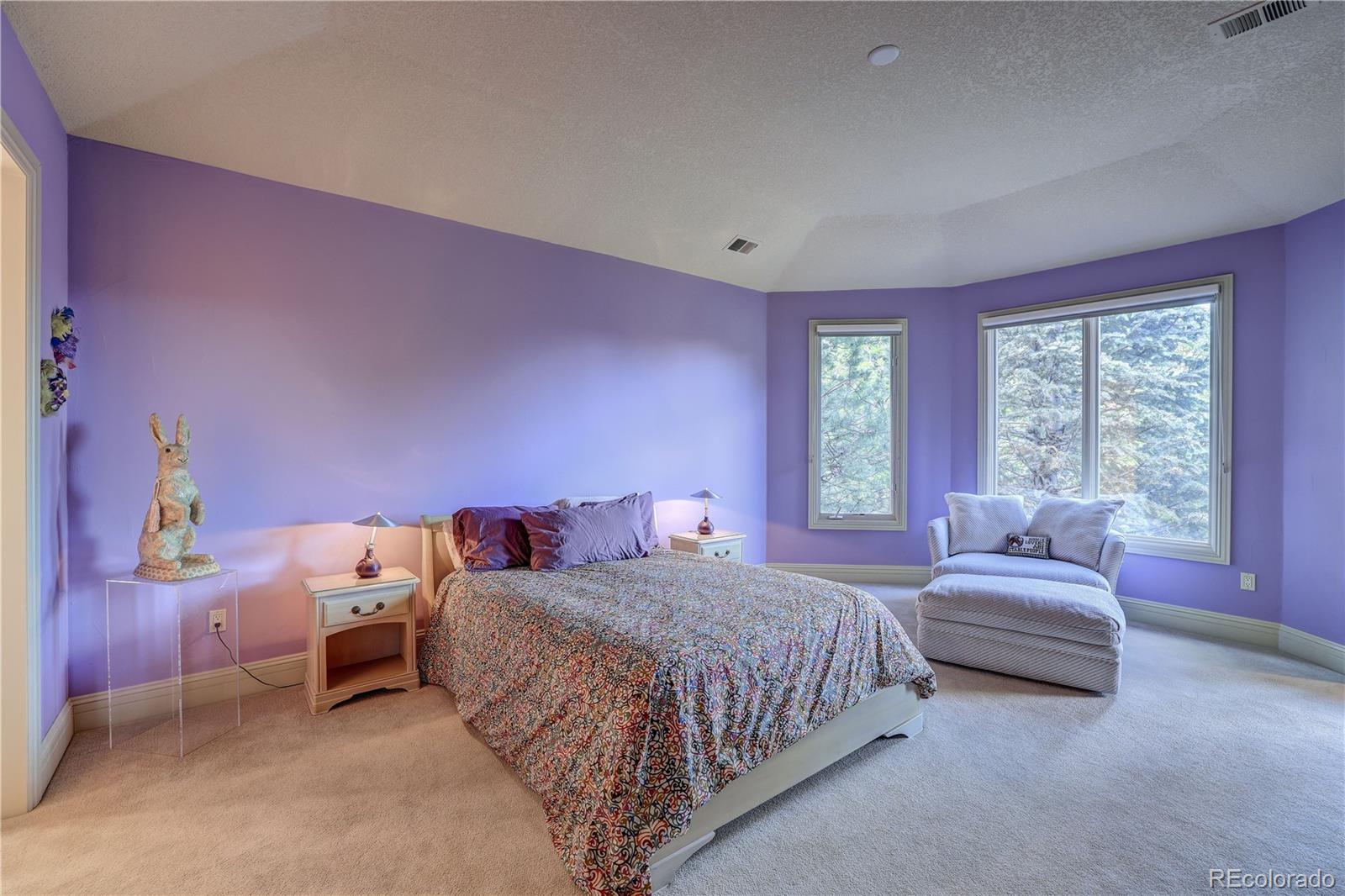 23 Foxtail Circle Cherry Hills Village, CO 80113 - Photo 34 of 40 a bedroom with a bed and a couch
