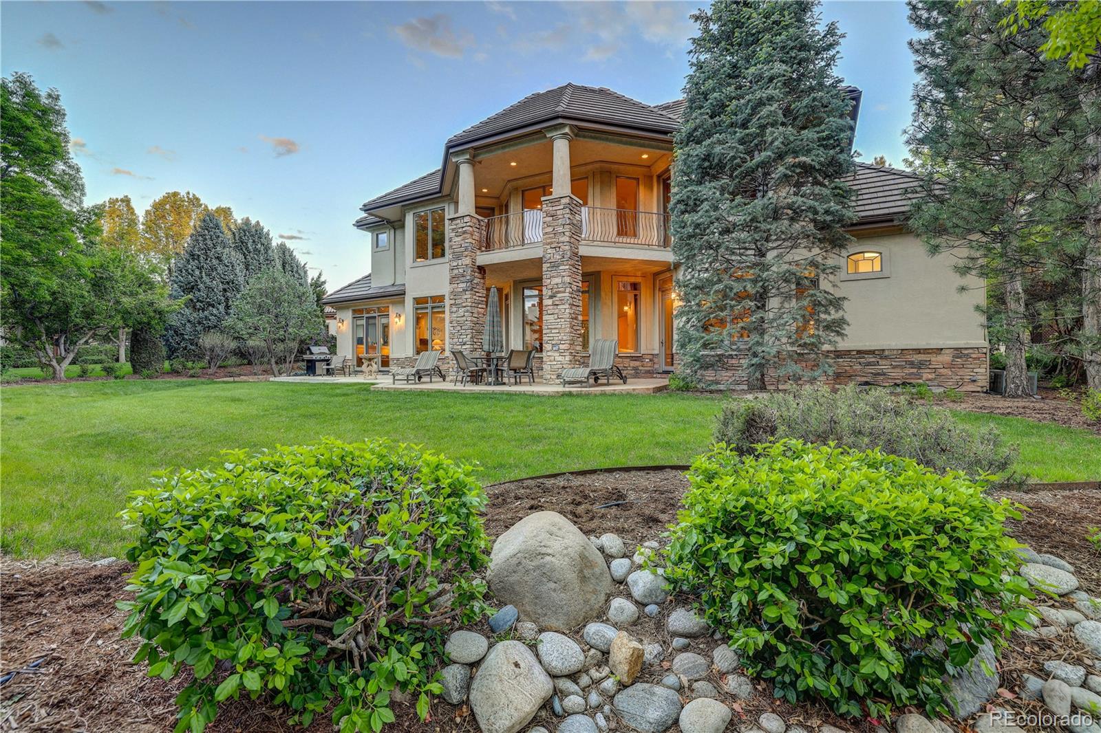 23 Foxtail Circle Cherry Hills Village, CO 80113 - Photo 5 of 40 a front view of a house with garden
