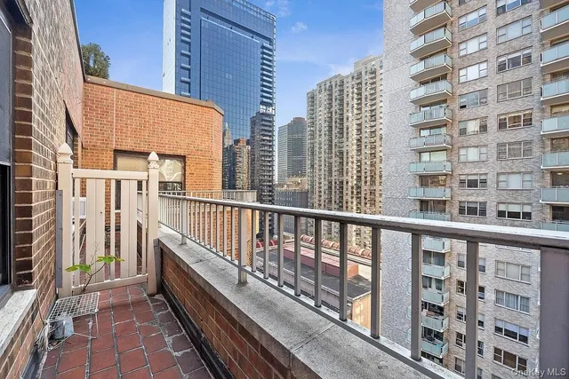 a view of city with tall buildings