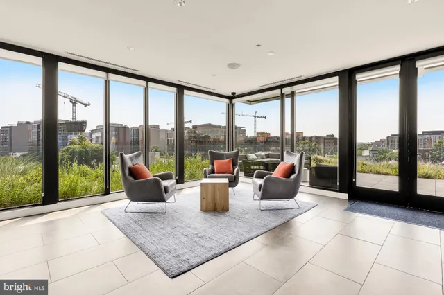 a group of people sitting in a living room