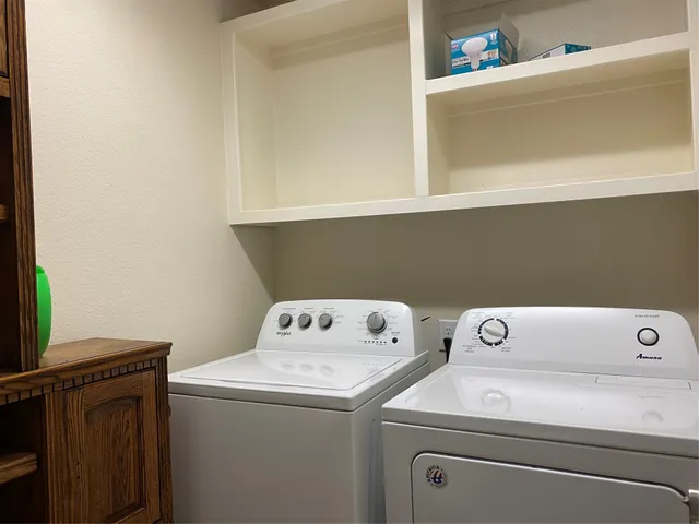 a utility room with dryer and washer