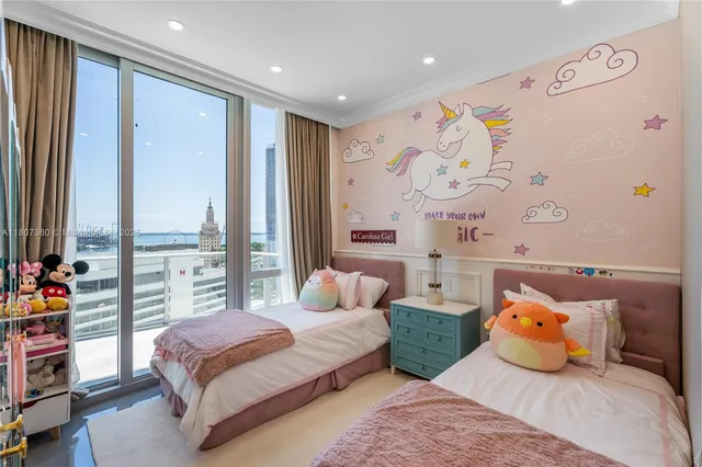 a bedroom with bed and window