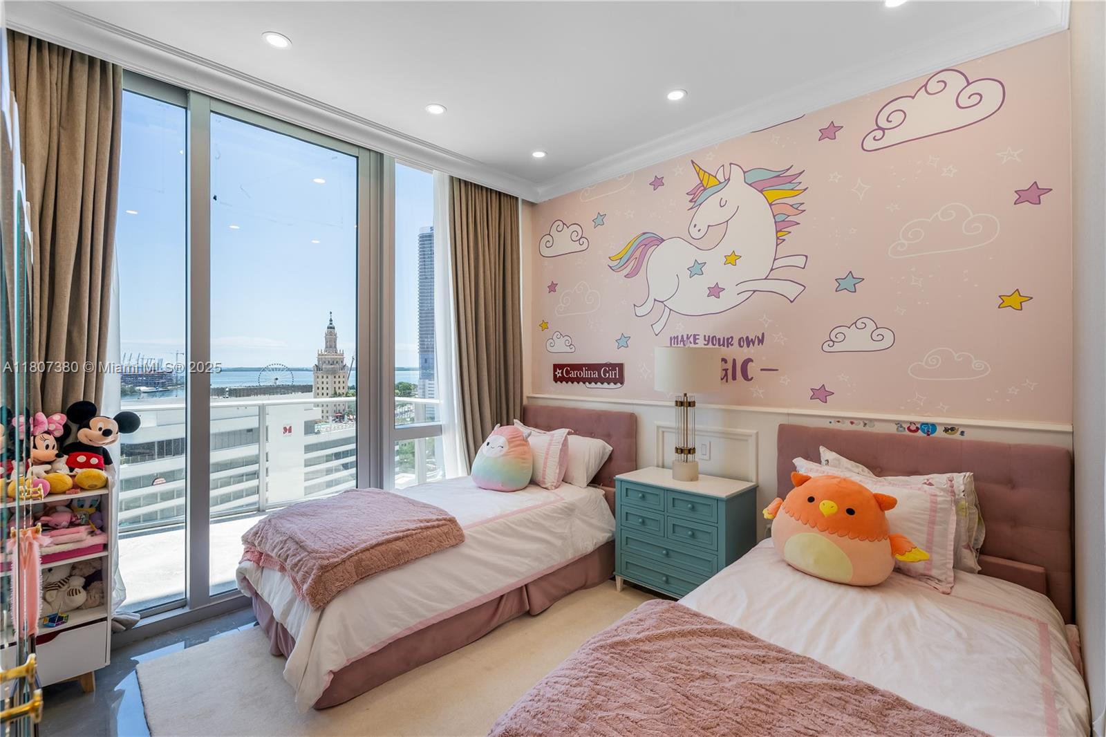 851 Northeast 1st Avenue, Unit 1409 Miami, FL 33132 - Photo 12 of 43 a bedroom with bed and window