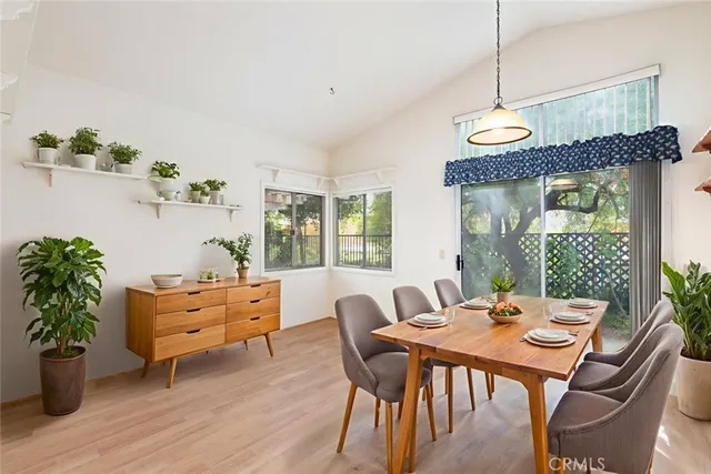 a view of a house with backyard and garden