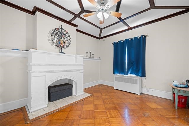 2746 John F. Kennedy Boulevard Jersey City, NJ 07306 - Photo 20 of 37 a view of entryway with a fireplace and wooden floor