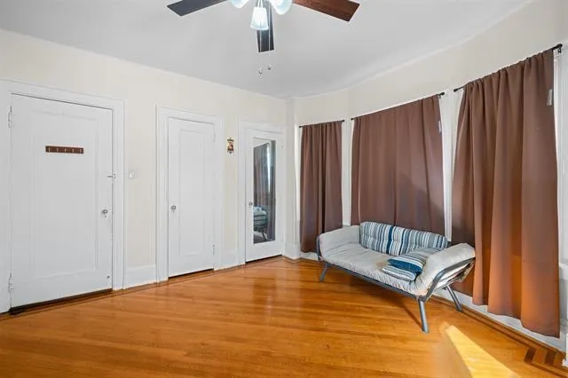 a view of room with stairs and furniture