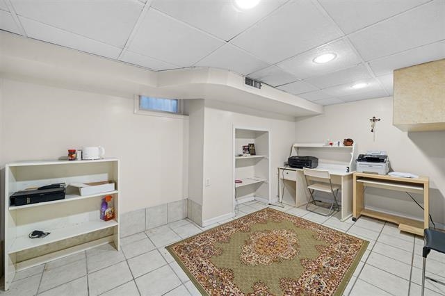 2746 John F. Kennedy Boulevard Jersey City, NJ 07306 - Photo 34 of 37 a kitchen with white cabinets and appliances