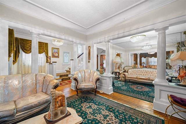 2746 John F. Kennedy Boulevard Jersey City, NJ 07306 - Photo 8 of 37 a living room with furniture and a wooden floor