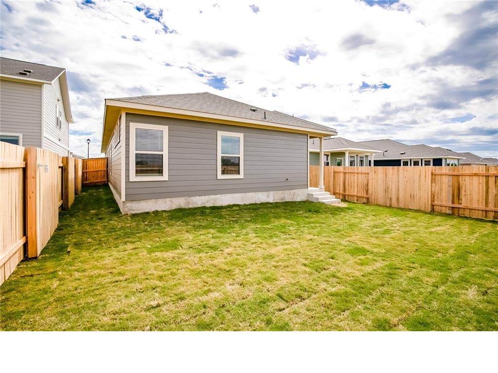 237 Unforgiven Lane Jarrell, TX 76537 - Photo 15 of 20 a bathroom with a sink window and shower