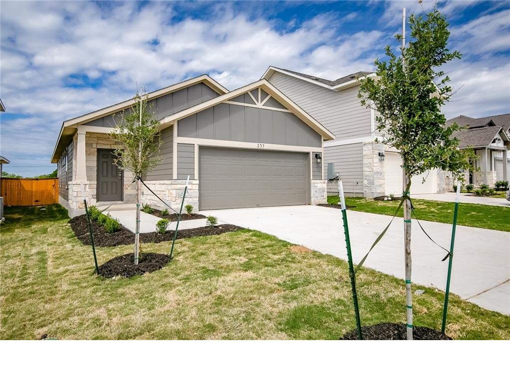 237 Unforgiven Lane Jarrell, TX 76537 - Photo 3 of 20 a house view with a outdoor space