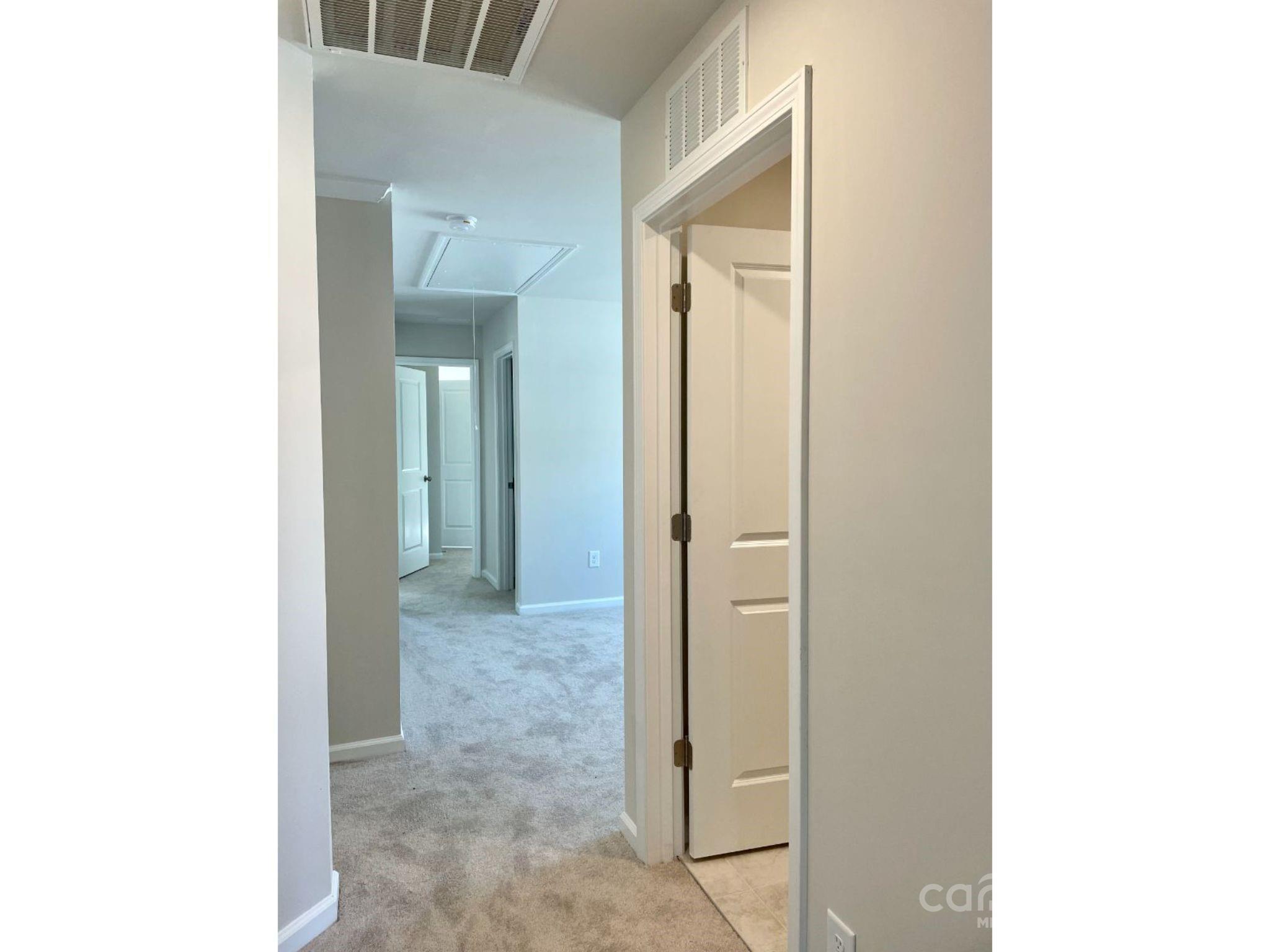 15904 Capps Road Charlotte, NC 28278 - Photo 6 of 21 a view of a room with a hallway