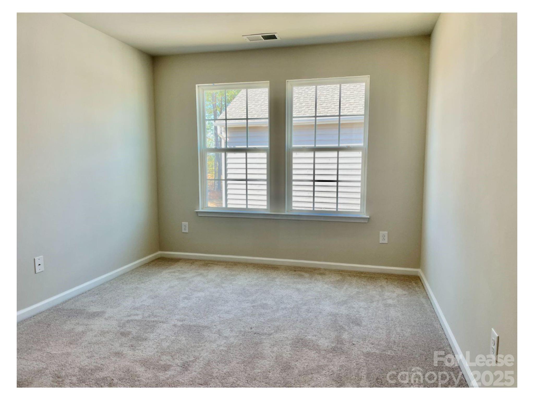 15904 Capps Road Charlotte, NC 28278 - Photo 7 of 21 a view of an empty room with a window