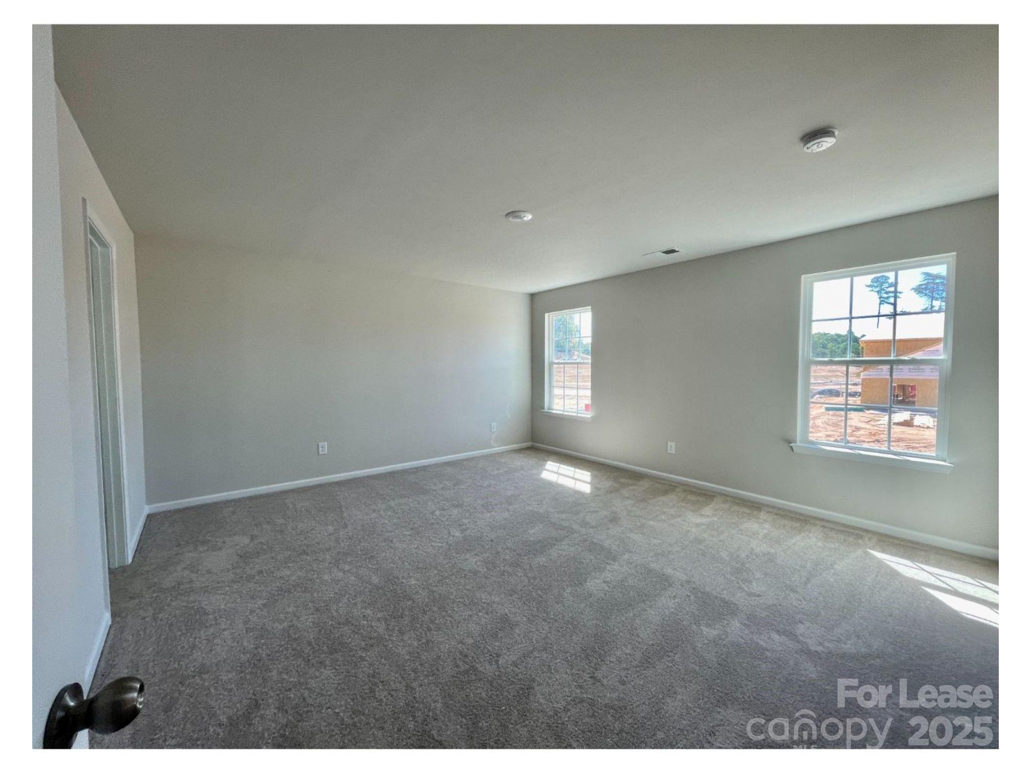 15904 Capps Road Charlotte, NC 28278 - Photo 10 of 21 a view of an empty room with a window