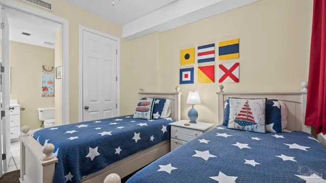 a bedroom with a bed and furniture