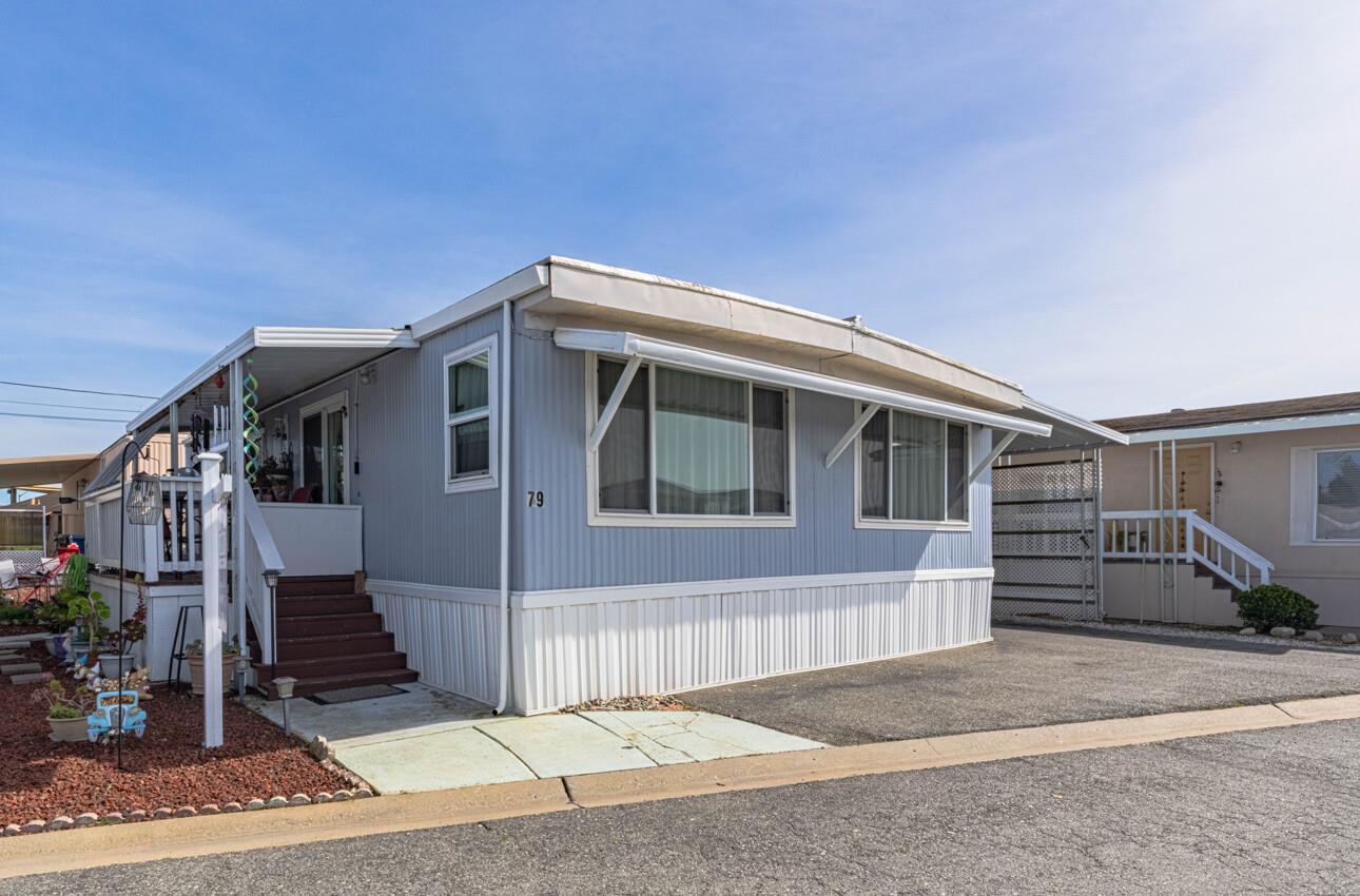 a front view of a house with garage