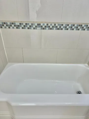 a bathroom with a bathtub