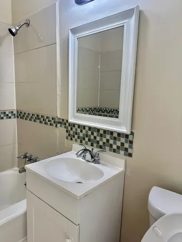 a bathroom with a sink and a toilet