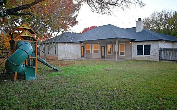 a house view with a garden space