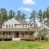 front view of a house with a garden