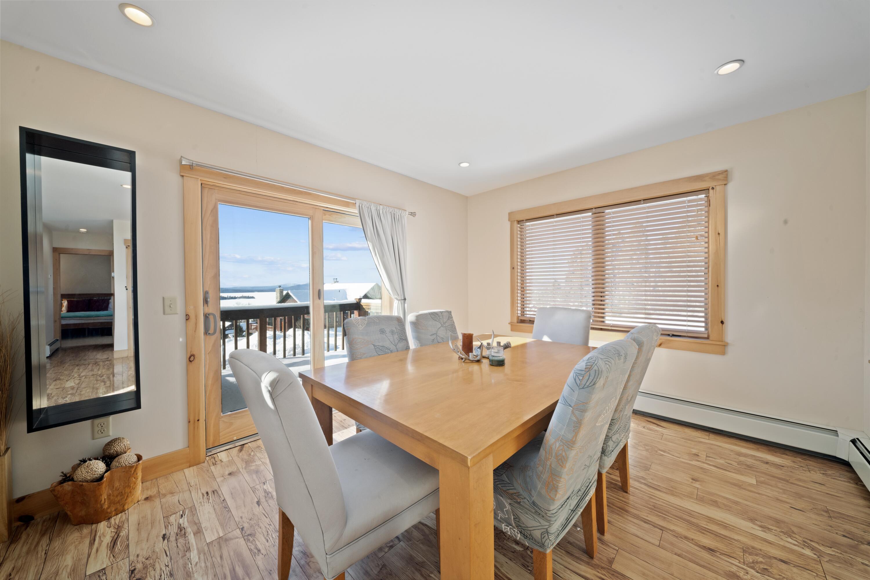 42 Whip Willow Farm Road, Unit 19 Rangeley, ME 04970 - Photo 11 of 51 Dining with a View