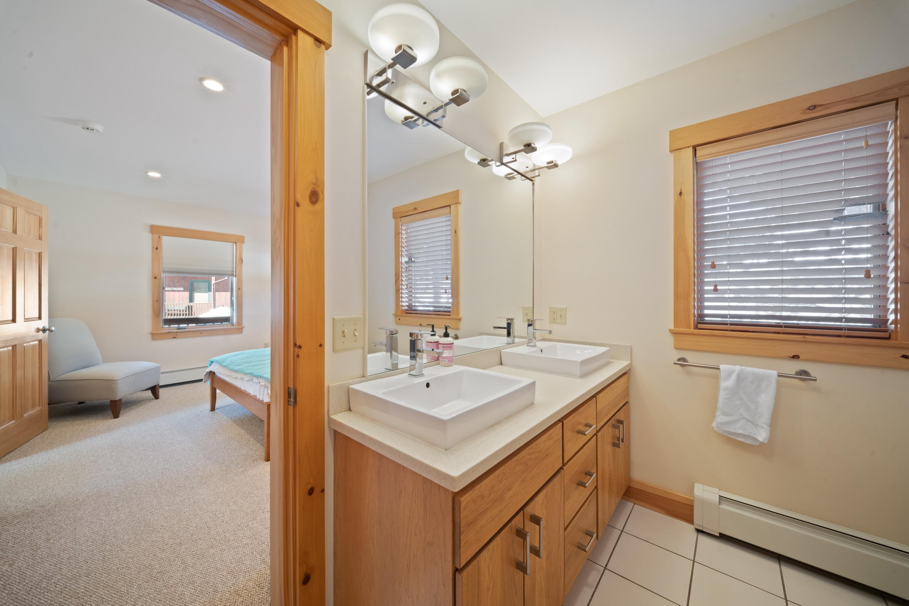 42 Whip Willow Farm Road, Unit 19 Rangeley, ME 04970 - Photo 27 of 51 Ensuite Bath