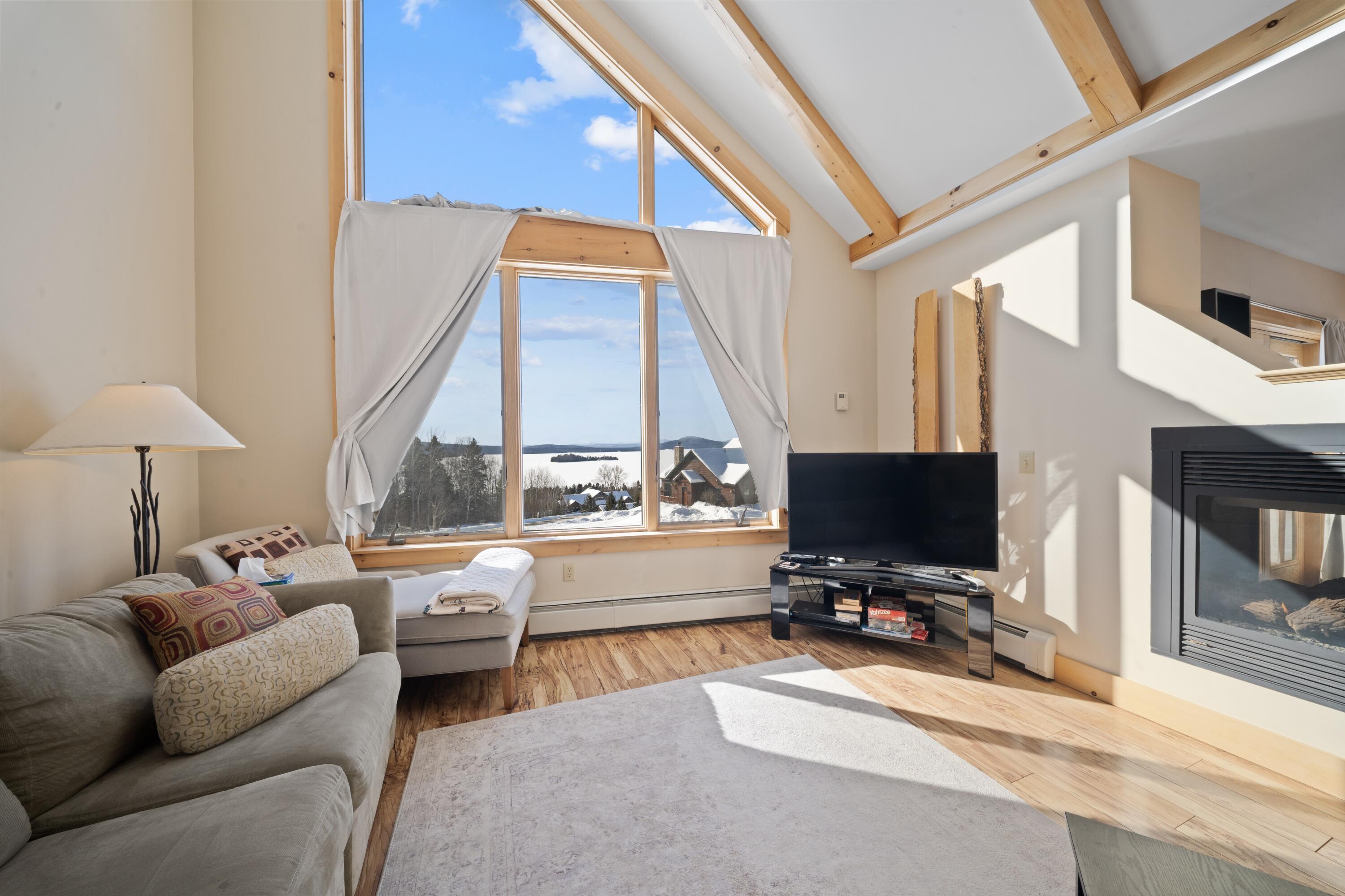 42 Whip Willow Farm Road, Unit 19 Rangeley, ME 04970 - Photo 6 of 51 Living and View