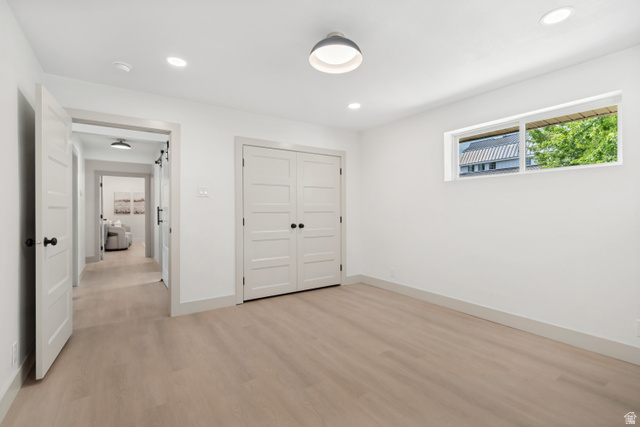 1010 West Maple Street Mapleton, UT 84664 - Photo 16 of 24 Well-lit room featuring light wood-finish flooring, white walls, and a recessed ceiling light