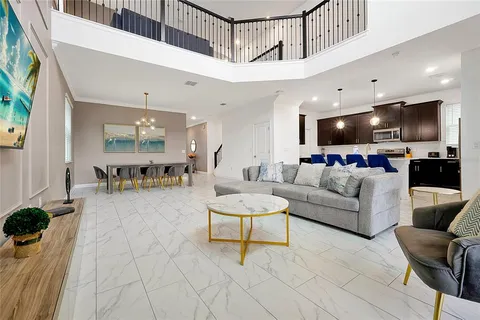 a kitchen with stainless steel appliances a sink stove and cabinets