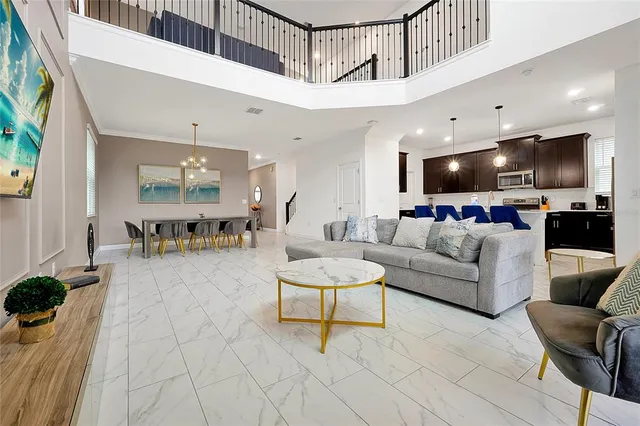 a kitchen with stainless steel appliances a sink stove and cabinets