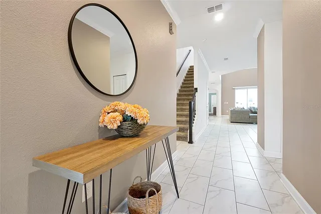 a kitchen with a sink appliances and cabinets