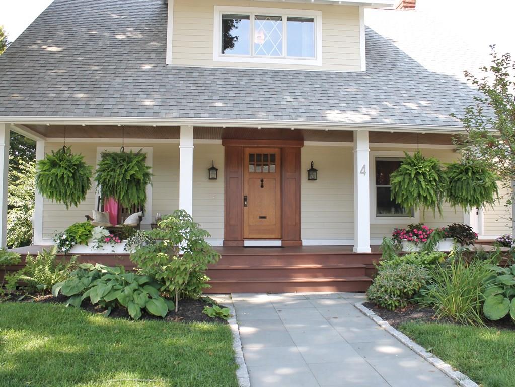 4 Ashmore Road Worcester, MA 01602 - Photo 2 of 38 a front view of a house with garden