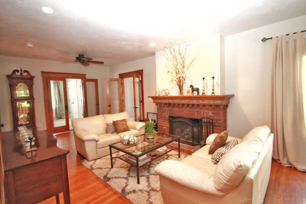 4 Ashmore Road Worcester, MA 01602 - Photo 3 of 38 a living room with furniture and a fireplace
