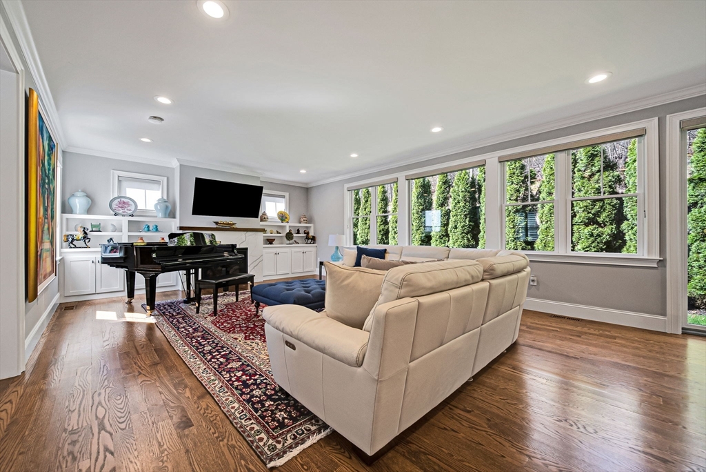 17 Sunrise Terrace Needham, MA 02492 - Photo 4 of 42 a living room with furniture and a flat screen tv