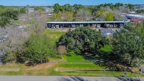 an aerial view of a house with a garden