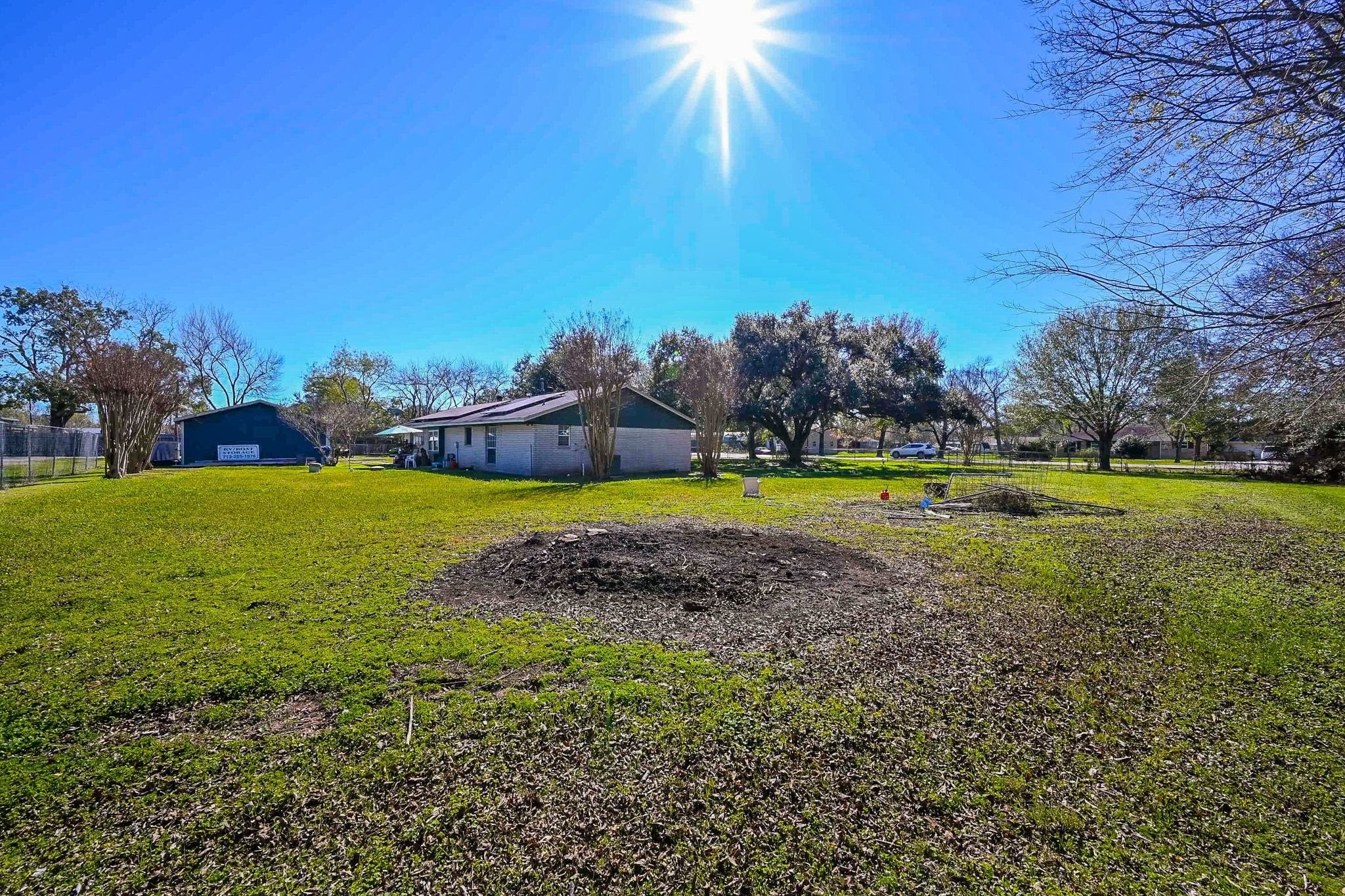 18910 Carrot Street Spring, TX 77379 - Photo 21 of 48 a view of a swimming pool with a yard